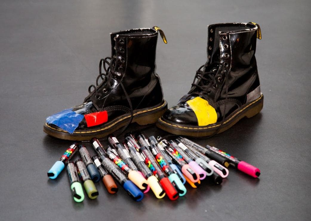 Booties decorated with stickers and colored markers