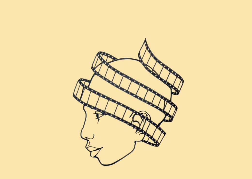 Person’s head encircled by a film reel.