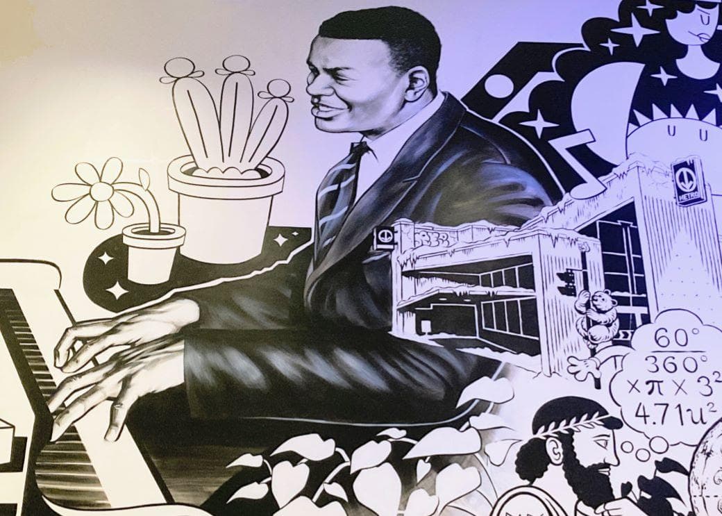 Detail of the MEM mural depicting a pianist who is a member of Montreal's Black community.